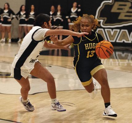 SHA’MYA COOPER takes the ball to the basket for the Hugo Lady Buffs against the Lady Savages of Broken Bow.