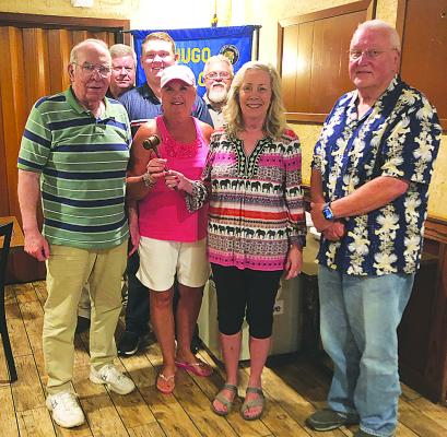 above: Hugo Lions Club elected officers for the upcoming year. Current President, Susan Brewer, passed the gavel to new President Harolynn Wofford. Looking on are newlyelected Vice President Joey Brindley, Secretary Clark LeForce, Treasurer Royce Chandler, Tail Twister Tracy Stonebarger, and Lion Tamer Mike Brewer. Contributed Photo
