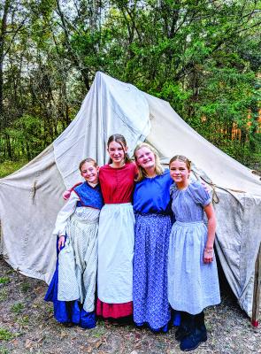 Young actress es rounded out the cast of this year’s Doaksville Candlelight Tour. The program highlighted the events surrounding the surrender of General Stand Watie at Doaksville, which officially brought the Civil War to a close. Pictured are River Noel, Lilah Thompson, Avery Womack, and Presley Couch.