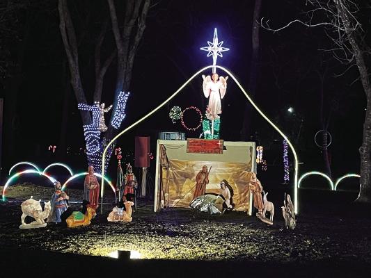 In the holiday spirit! Unity Baptist Church, located at 805 W. Arthur St. in Hugo, spreads holiday cheer with an arrangement of Christmas decorations on the lawn. Pictured is a portion of the festive decorations.