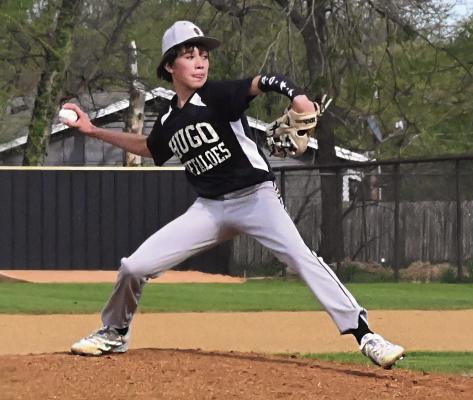 JACE BAKER comes out of his stretch on the mound for the Hugo Middle School Buffaloes Monday at Shull-Bywaters Park, to throw a strike against the McAlester Buffalo batter. The Buffaloes battled to a 3-2 win in the first game in a contest that went down to the final throw to be decided. (BELOW) J.B. Cochran makes a big swing but narrowly misses a McAlester pitch. Hugo News Photo / Stan Stamper