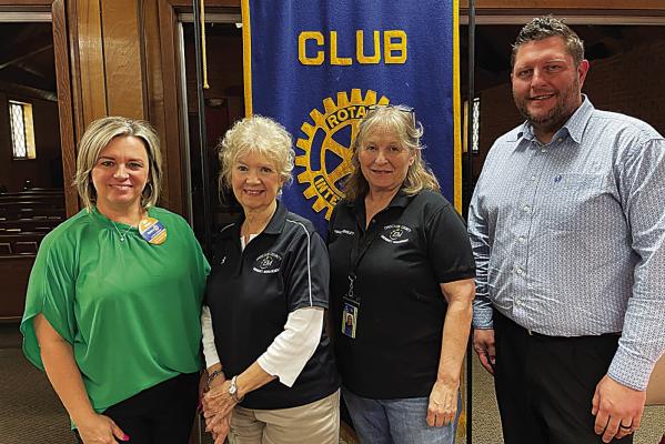 Pat Collins (center-left) of Choctaw County Emergency Management spoke to the Hugo Rotary Club recently about the upcoming solar eclipse and area preparations for the traffic and logistical issues it brings. She is pictured (l-r) with Club President-Elect/Treasurer Amy White, Wanda Hensley of Choctaw County Emergency Management, and Rotarian Zack Savage.