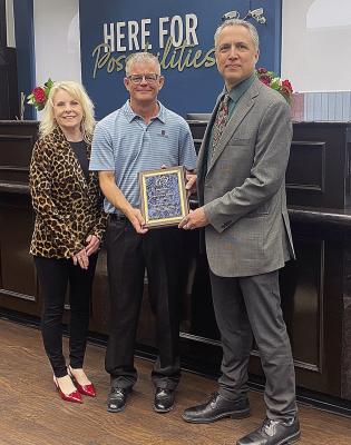 Pictured are Janis Reeser, Mike Burrage and Matthew Farve.