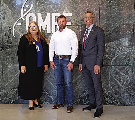 Oklahoma Medical Research Foundation Vice President of Clinical Affairs Judith James, M.D., Ph.D., U.S. Sen. Markwayne Mullin, and OMRF President Andrew Weyrich, Ph.D.