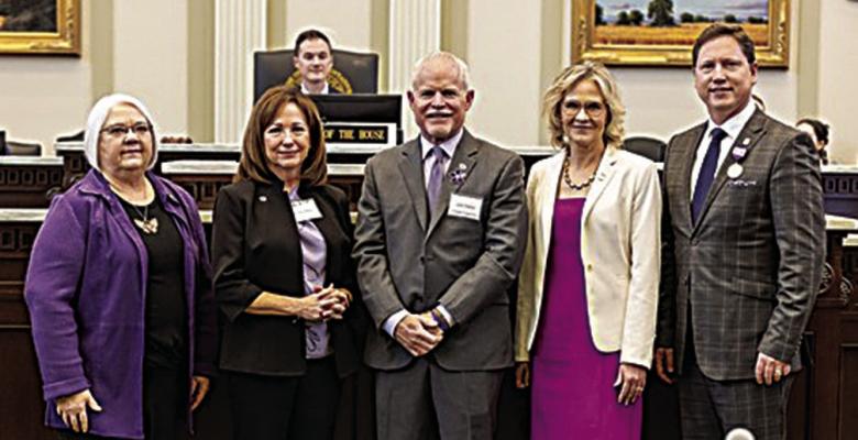 PHOTO: (L-R) Rep. Marilyn Stark, Debbie Elliot, John Pellow, Rep. Nicole Miller and Rep. Brian Hill on the floor of the Oklahoma House of Representatives.
