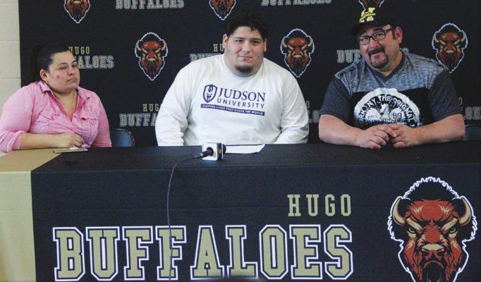 HUGO BUFFALO LUCIANO ROSALES signed a letter of commitment to play football at Judson University in Elgin, Ill. He is pictured with his father Armando Rosales and stepmom, Natalia Fusco. (Hugo News Photo / Krystle Taylor)