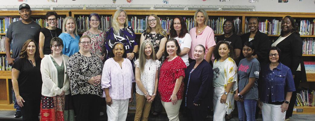Hugo Intermediate School: Top row: Leonard Smith, Nancy Welch, Jennifer Nelson, Cheryl LaRue, Dana Scoggins, Katelynn McGriff, Joanie Cochnauer, Alicia Mack, LaShonda Johnson, Vivian Shanklin, Keashi Brown. Bottom row: Jeania Sharp, Elizabeth Rember, Ashley Briggs, Elizabeth Calvin, Kit Pipkin, LaDonna Baldwin, Kay Tucker, Judith Cavalini, Patti Brown,Tammie Oakes.