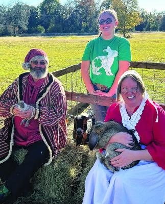 Santa and Mrs. Claus enjoyed making new furry friends at the Fort Towson Historic Site’s annual Christmas program. Taylor Vandever, a Choctaw County 4-Her, provided animals and education for the petting zoo. The event highlighted some of the Christmas traditions of the 1800s.