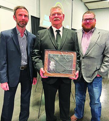 Coach Alan Cartwright (center) was recently inducted into the Oklahoma Baseball Coaches Hall of Fame. He is pictured with sons: Broc and Choc. See today’s Sports for more information, pages 1B &amp; 2B.