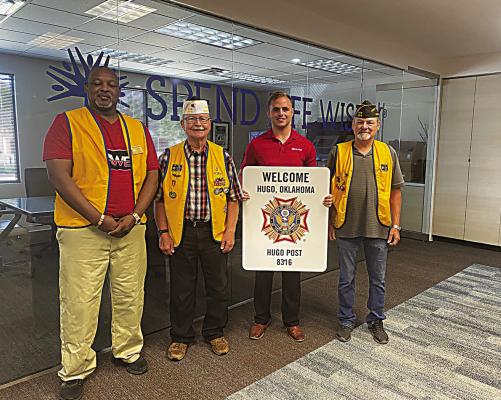 First United Bank recently donated street signs for the local VFW club. The VFW, located on Jackson St. in Hugo, holds bingo nights on Monday, Thursday and Friday each week, with early bird specials beginning at 6 p.m. Pictured from the VFW are: Donald Dangerfield, Dan O’Grady and JK Smith. Holding the sign is First United’s Gary Newberry.