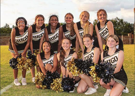 Cheering their team to VICTORY...