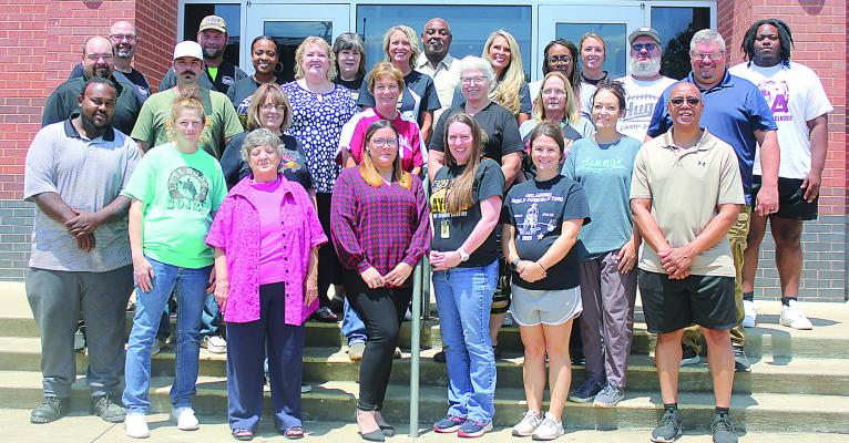 Hugo High School staff includes: Front row: Reggie Johnson, Ashley Parker, Kathy Singleton, Amber Patterson, Jordana Frost, Darnell Shanklin. Second row: Sammy Drinkard, Brady Palmer, Brenda Blankenship, Lori Hicks, Marilyn Krause, Darlene Muelller, Amiee Frost-Pinson, Chance Baker. Back row: Scott Schier, Krystopher Gross, Lasha Cook, Beverly Summitt, Ladonna Plott, Kristen Lemmons, Donald Dangerfield, Christine White, Kiyoko Woods, Jori Ketchum, Brad Greer, Donte Shanklin.