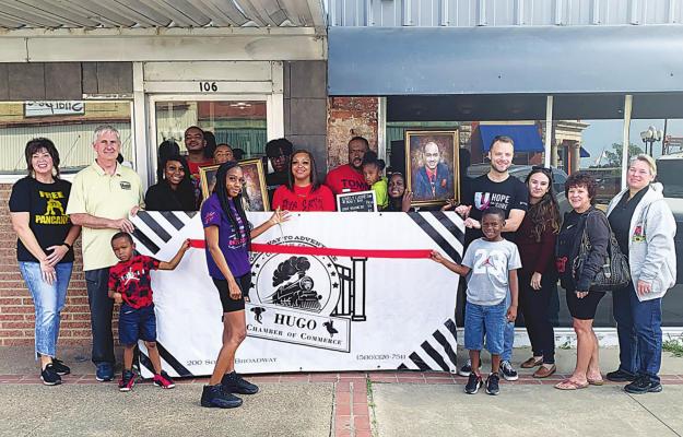Ribbon cuttings in Hugo...