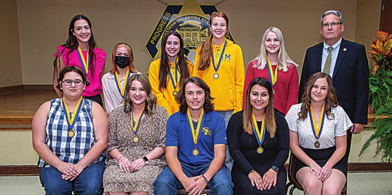 Above left: Southeastern president Thomas Newsom joined the Top 10 Freshman Award recipients for a group photo. Front row, left to right: Madison Saunders, Chloe Miller, Mason Phillips, Emma Quintana, and Alaura Gilmore. Back row: Rachel Goade, Dottie Fuhr, Maci Bookout, Lauren Beason, and Faith Isenberg.
