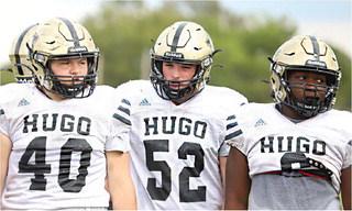 BUFFALO LINEMEN Jayce Trantham, Ethan Sparks and Kory Mitchell listened to coaches during practice this week in preparation for the big Friday clash with the state-ranked Idabel Warriors. Kickoff time will be Friday here in Gene Nesbit Stadium... 7 p.m. Hugo News Photo / Kelli Stacy