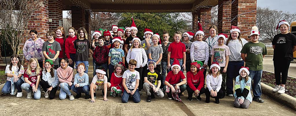 Fort Towson Elementary School’s third and fourth grade students sang Christmas carols, gave cards, and shared original artwork with the residents at Homestead of Hugo Nursing Home. Third grade teachers are Katherine Cloud and Julie Birdsong; Fourth grade teachers are Shelly Rentz and Vickie Franks.