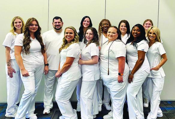 Front row, left to right: Ashley Sober, Jennifer Savage, Isabella Morelli, Alyssa Gallant, Destiny Williams, Candi Rayburn. Back row, left to right: Jordyn Teague, Austin Cone, Abigayle Farmer, Shaniqua Gage, Amy Erwin, Diane Moore.