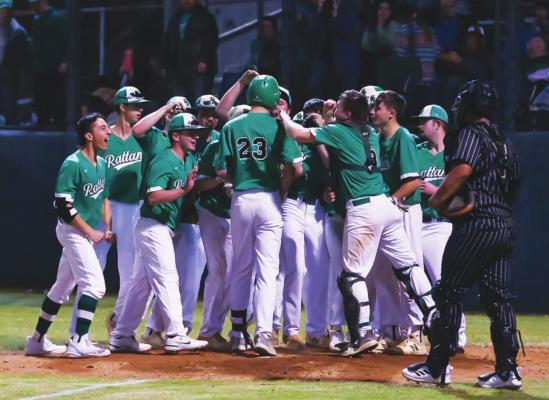 RATTAN’s DAWSON ADDINGTON is congratulated at home plate after slamming a home run against Hugo in baseball action earlier this season. Hugo News/Bobby Hamill