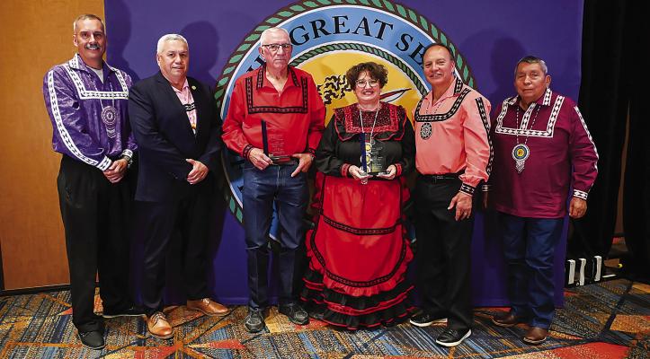 Tribal leaders pose with the winners of the 2024 Outstanding Elders. Pictured left to right: Assistant Chief Jack Austin, Jr., Tribal Council Member Eddie Bohanan, Jerry Bohanan, Gina Self, Chief Gary Batton, and Tribal Council Member Perry Thompson. Contributed Photo