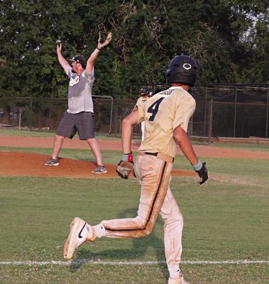 HUGO HIGH SCHOOL BUFFALO returning starter Jacoby Teague rounds third base and looks back to check out a possible throw to home plate during last week’s Hugo Buffalo baseball action. Hugo News Photo / Stan Stamper