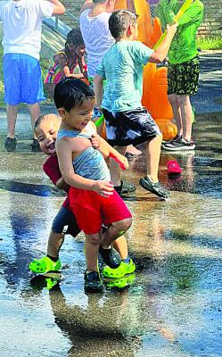 Braylen Battiest, 1-year-old and his brother Alec, 2-years-old, enjoy a day of water activity at Turner Learning Center in Hugo on Friday, July 25. Photo Courtesy / Turner Learning Center