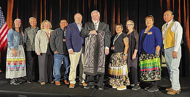 Frank Wolf was recognized as Attorney of the Year in Indian Country by the National American Indian Housing Council (NAIHC) at their recent Legal Symposium in Las Vegas on Dec. 10-24. Frank was selected for this national award after being nominated by the Housing Authority of the Choctaw Nation of Oklahoma. From left to right: Jody Perez, Tom McGeisey, Kelly Cook, Jamie Navenma, Bobby Yandell, Frank Wolf, Charlotte Roberts, Sami Jo Difuntorum, Marcy Gouge and Patrick Goggles.
