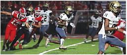 DONTEZ CHERRY a 6’ senior for the Hugo Buffaloes, breaks through the Kingston line and picks up valuable yardage against the Redskins during Friday’s non-conference battle. Hugo News Photo / Kelli Stacy