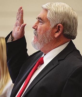 GEORGE BURNS takes the oath of office for Senate District 5 surrounded by family and friends at the Oklahoma Capitol.