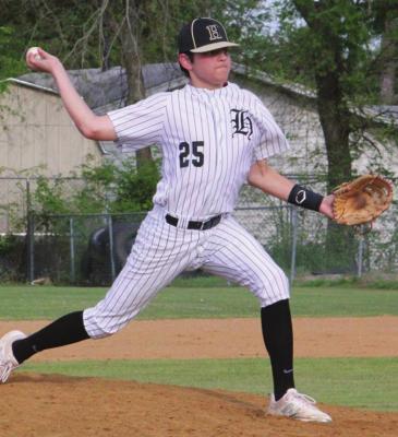 HUGO MIDDLE SCHOOL PITCHER Logan Allen steps into a big pitch for the Hugo Buffaloes Monday as they take on the Coalgate Wildcats. ( Hugo News Photo by Stan Stamper)