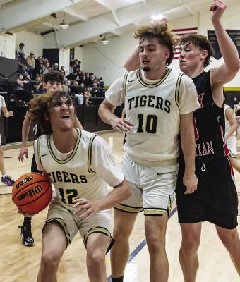 Clayton edges Tigers, 42-36