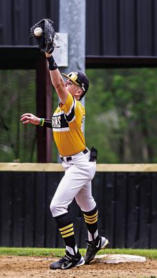 KYLER CHESHIER stretches at first to make the catch... and the out for the Boswell Scorpions.