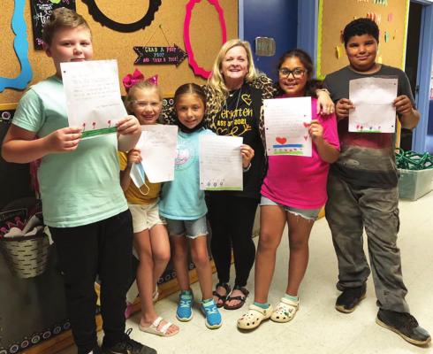 MRS. JULIE BIRDSONG’S third grade class