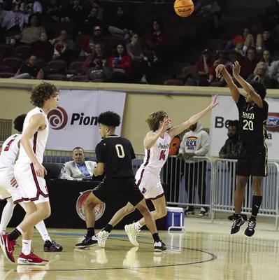 LORENZO KING turns loose of a three-point shot early in last week’s Oklahoma Class 3A Mens Basketball playoffs at the State Fairgrounds stadium in Oklahoma City. The shot was one of only two treys the Buffaloes would score throughout the entire game at the Big House’s last State Championship Tournament. Hugo News Photo / Kelli Stacy