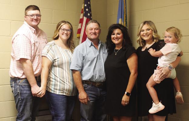 Pictured with Alan Reynolds during the swearing-in ceremony were a few members of his family: Dillon and Hannah Beene, Reynolds, his wife Malachi Reynolds, Sydney Beene and Ira Beene (daughter of Dillon and Hannan). Family members not pictured were Sarah Reynolds and Hagan Reynolds.