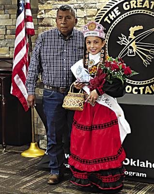 Acelee Ellis was recently crowned Choctaw Nation District 8 Little Miss Princess. She is the daughter of Heather and Jerren Ellis and great-granddaughter of the late Barbara McKee. Acelee is pictured with District 8 Councilman Perry Thompson.