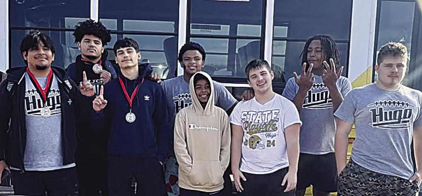 HUGO BUFFALO POWER-LIFTERS recently brought home some heavy iron from a regional meet in Tishomingo. Pictured above are: Chance Baker, KeyShawn Miller, Noah Allred, Tamareon Jeffries, Brandon Beal, Ladellreon Daniels and Zakk Gilmore. (Student in the hoodie is a little brother... future Buffalo powerlifter.) Photos Courtesy Coach Mark Rosa