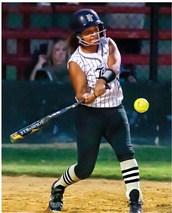 (Left) JAIDA MIMS puts a good swing on a pitch for the Fort Towson Lady Tigers during their recent game against the Lady Bears of Soper. (RIGHT) MADISON DIGGS steps into a pitch for Fort Towson’s Lady Tigers during last week’s battle with Soper. Hugo News Photo / Bobby Hamill Jaida Mims