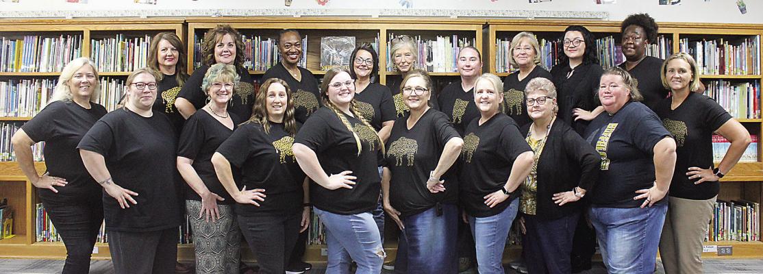 Hugo Intermediate School staff includes: Top row (left to right): Amy Caraway, Cherie Barnes, Vivian Shanklin, Tammie Oakes, Kit Pipkin, Kay Tucker, Mary Taylor, Kameron Raper and Keisha Brown. Bottom row (left to right): Dana Scoggins, Ashley Briggs, Cheryl LaRue, Jeania Sharp, Morgan Keith, Denise Bell, Jennifer Nelson, Shelia Thompson, Shelia Raines and Alicia Mack. 