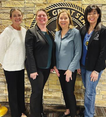 Pictured are: Brandy Blaloc k, Hugo Superintendent; Brandi Cook, Secondary Curriculum, Instruction, and Assessment Director; Dr. Donna Hicks, and Hugo School Board member Michele Frazier.