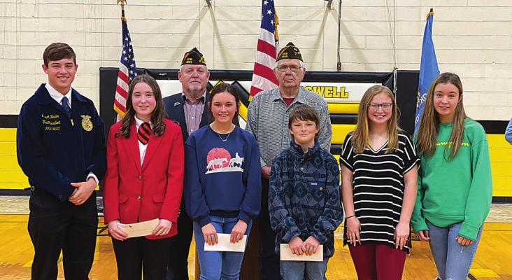 VETERANS ESSAY WINNERS are (pictured left to right): Voice of Democracy (High School): Garrett Bacon second place; Kansas West first place; Morgan Harless third place. Patriot’s Pen (Junior High): Case Smallwood third place; Bella Manous first place; Kaydence West second place. Also pictured are Boswell VFW members