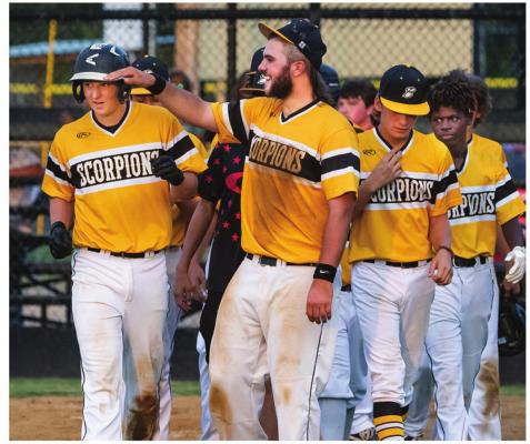 McIntyre congratulated for Home Run!