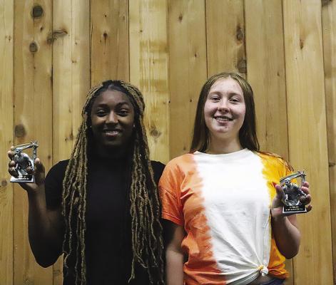 Keshawna Scroggins and Calista Kelly were named co-offensive players of the year for basketball.