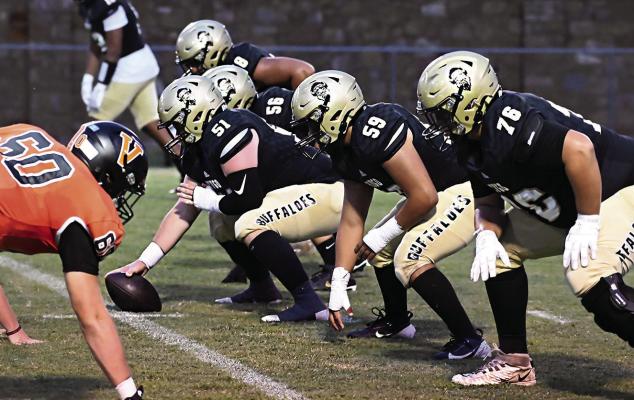 BUFFALOES IN THE TRENCHES — On every snap... on every play, the players up front in the trenches are the first to go to battle for the Hugo Buffaloes. Above (l-r) are: Keyshawn Miller, Andrew Raper, Jayse Trantham, Jonathan Chavez and Zane Allen. Whether handing the ball off to running backs or dropping back to pass, Buff quarterback Jayka Santillan depends on the guys up front to give him time and space to make a play work. Hugo News Photo / Stan Stamper