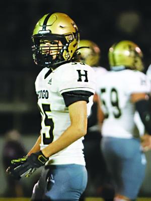 SOPHOMORE ETHAN WESLEY listens to defensive instructions from Buffalo coaches on the sideline during the Hugo-Eufaula game Friday. Wesley also chalked up one offensive carry during the game, adding two yards to the Buffaloes’ total offense. Hugo News Photo / Kelli Stacy