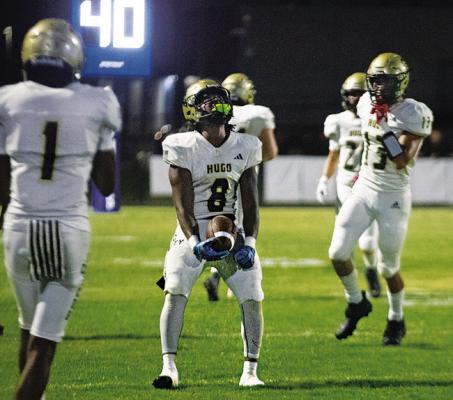 JA’MARI SCROGGINS celebrates after intercepting a pass for the Buffaloes, as teammates Ca’Marian King and Zaven Siniga congratulate him. H ugo News Photo / Kelli Stacy