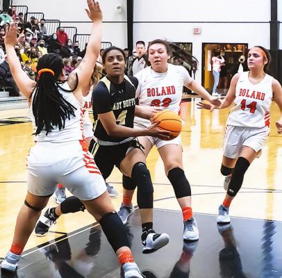 HUGO BUFFALO SENIOR JORDAN HOLMAN has amazed fans all season long with her ability to knife through opposing defenses as shown above. She will lead the Lady Buffs at State Fairgrounds Arena in Oklahoma City Wednesday night. Hugo News Photo / Bobby Hamill