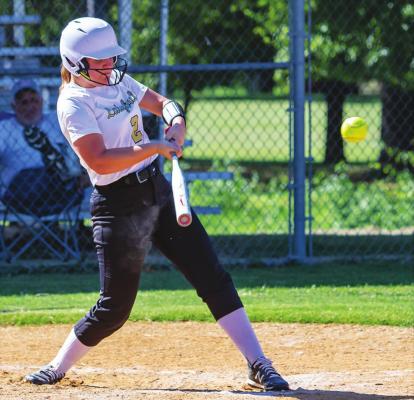 BRINLEE ALLENSWORTH rips a hit for the Hugo Lady Buffaloes in a recent game in Hugo. The Lady Buffs will be in the Wright City Classic this week where they will face some tough regional competition. (Hugo News Photo / Bobby Hamill)