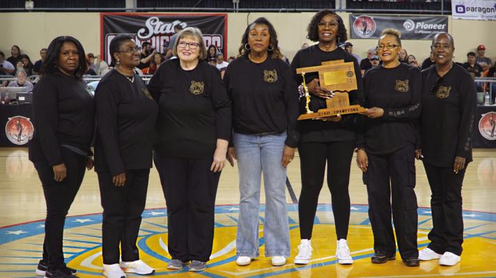 FORT TOWSON LADY TIGER LEGENDS! — Shirley Williams, Pat (Jefferson) Jones, Terry Smith, Diane (Knight) Ray, Belinda (Candler) Copeland, Sharon Tucker and Hettie Davis. All recognized last week at the State Playoffs, for their historic 1974 Championship run!