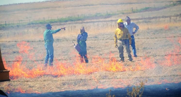 OSU Extension Fire Ecology Specialist John Weir, left, talks with participants of a Fighting Fire with Fire workshop at Greenfield in October. Photo Courtesy / Oklahoma Conservation Commission