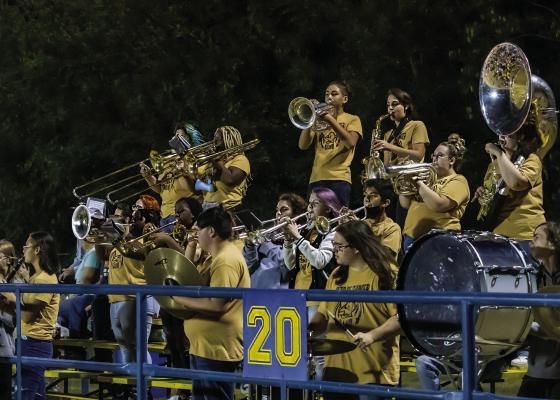 MEMBERS OF THE HUGO BUFFALO HERD OF THUNDER BAND kept the Hugo football fans and players charged up during last week’s BLACK and BLUE BOWL clash in Antlers. The Band is under the direction of John Sinibaldi and has received numerous awards for its outstanding performance. Hugo recorded a big win over the Bearcats, 59-12. Hugo News Photo / Bobby Hamill